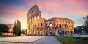 View of a lit up colosseum in Rome