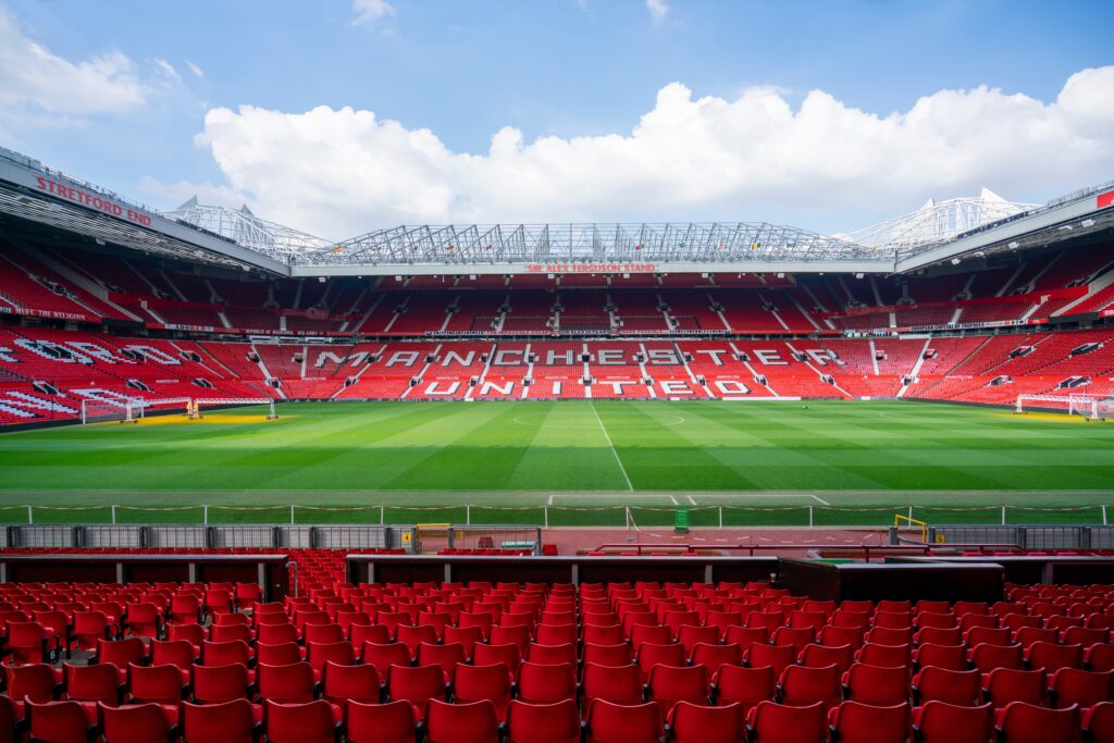 Wide shot of the seating bowl at Manchesters Old Trafford Stadium.