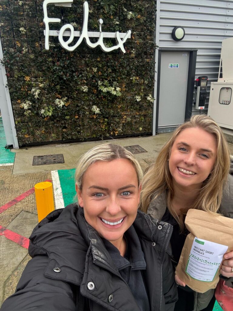 Brit & Meg outside the Felix Project head quarters