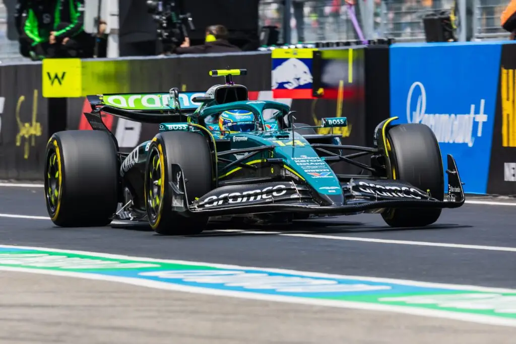 Aston Martin Formula 1 car in the pit lane at the Japanese Grand Prix.