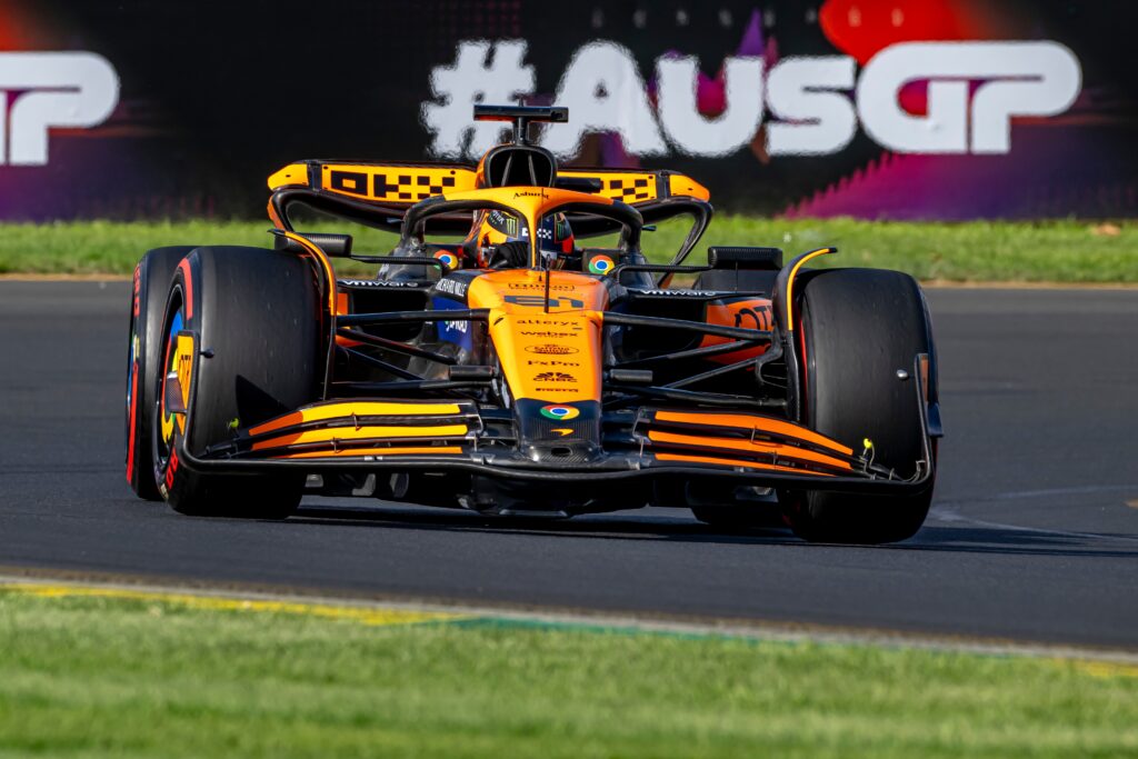 Front view of a McLaren Formula 1 car on track at the Australian Grand Prix.