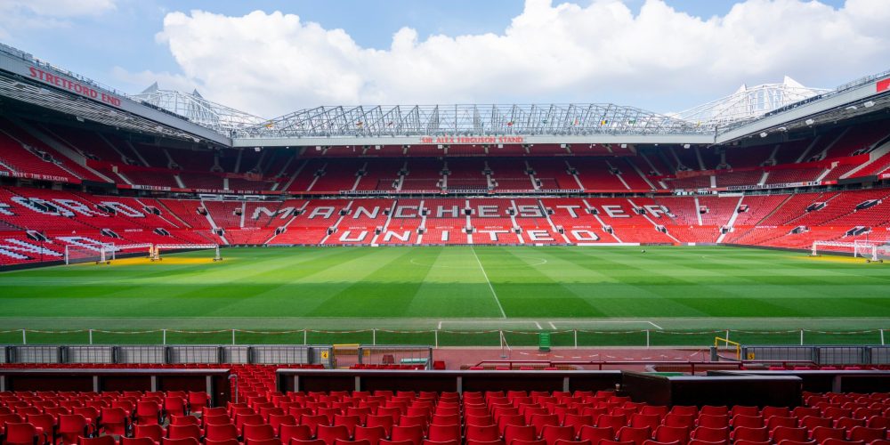 Wide shot of the seating bowl at Manchesters Old Trafford Stadium.